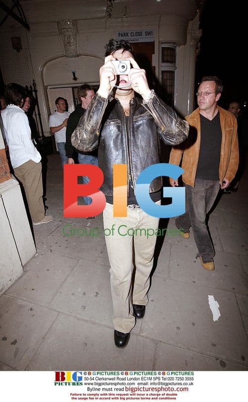 Robbie Williams and Friend at Wellington Club