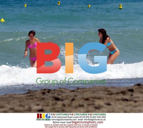 The Cheeky Girls on holiday in Spain