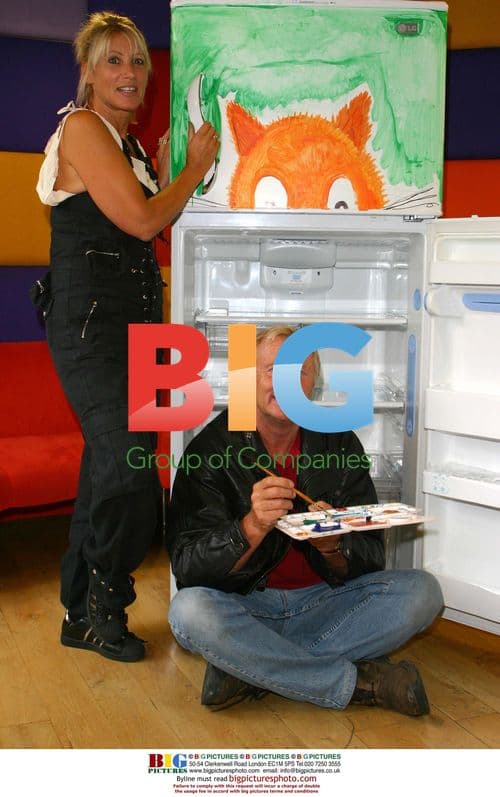 Chris Tarrant and wife paint fridge for charity