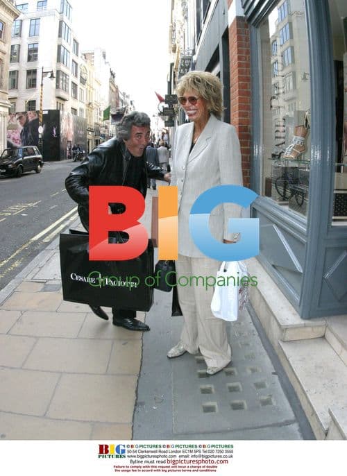 David Dickinson and wife Lorne out in London