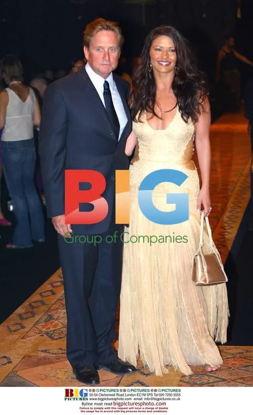Catherine Zeta-Jones and Michael Douglas at Versace Men\'s Show