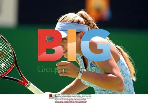 Anna Kournikova wins doubles match