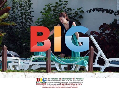 SKY TV Presenter Kirsty Sunbathes in Bikini