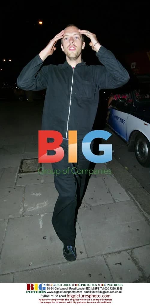 Chris Martin Leaving Restaurant in London
