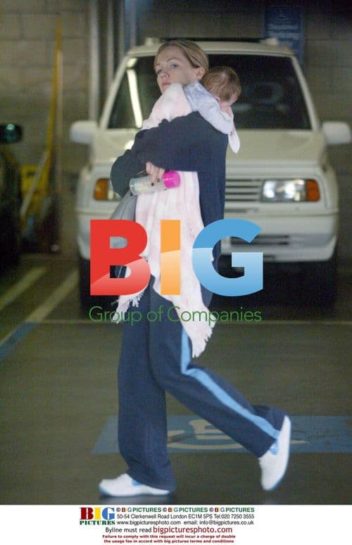 Jenny Garth and family out in the park