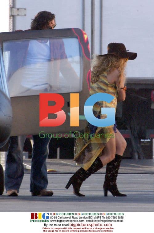 Mariah Carey arrives by helicopter