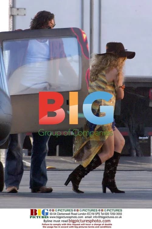 Mariah Carey arrives by helicopter