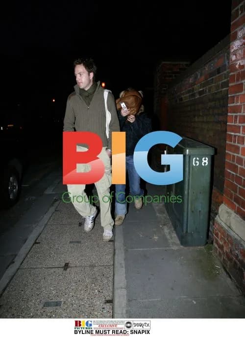 POP SINGER GERI HALLIWELL TRIES TO HIDE BEHIND BAG WITH FRIEND
