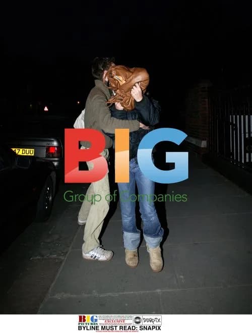 Geri Halliwell Hiding Behind Bag With Friend