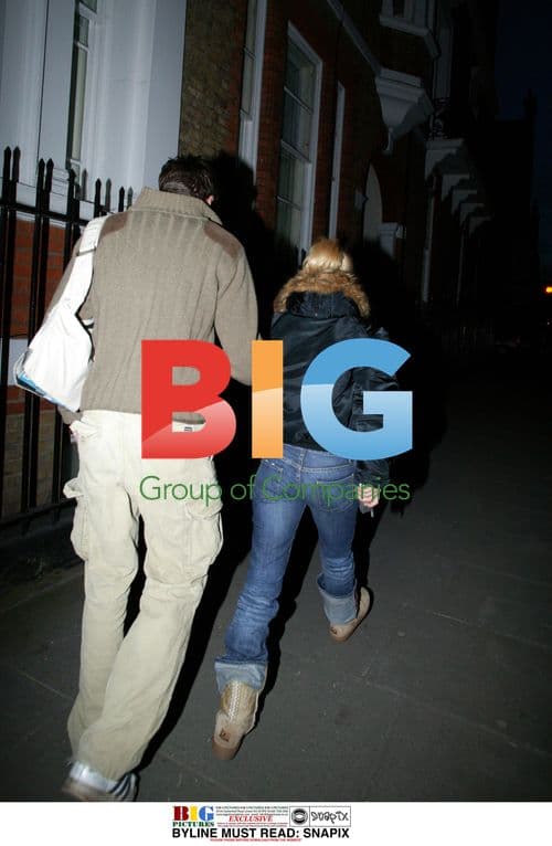 Pop Singer Geri Halliwell Tries to Hide