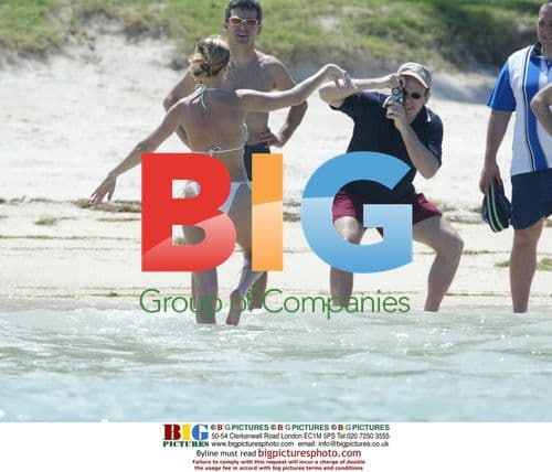 Chrissy Teigen Poses on Red Carpet