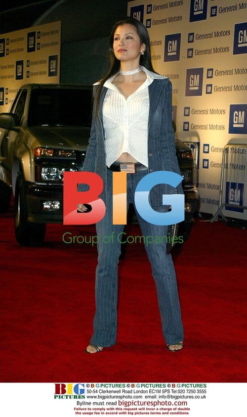 Lily Collins Departs Hotel