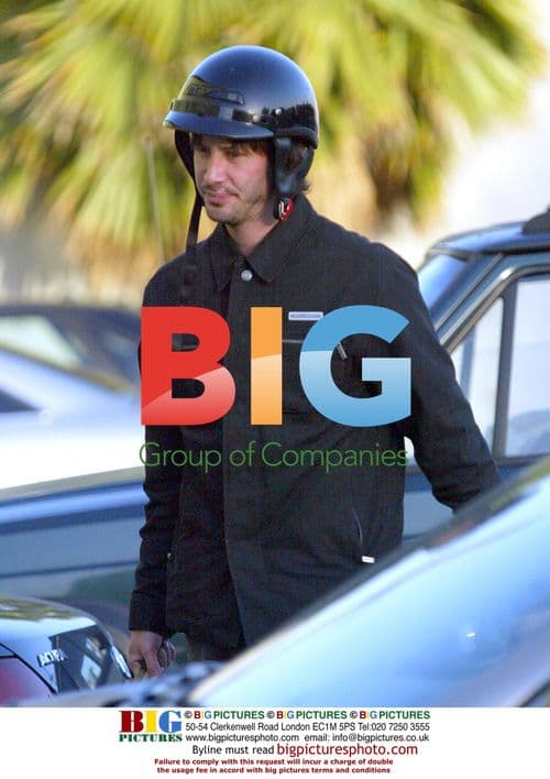 Keanu Reeves Leaving Gym on Bike
