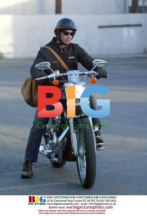 Keanu Reeves Leaving Gym on Motorcycle