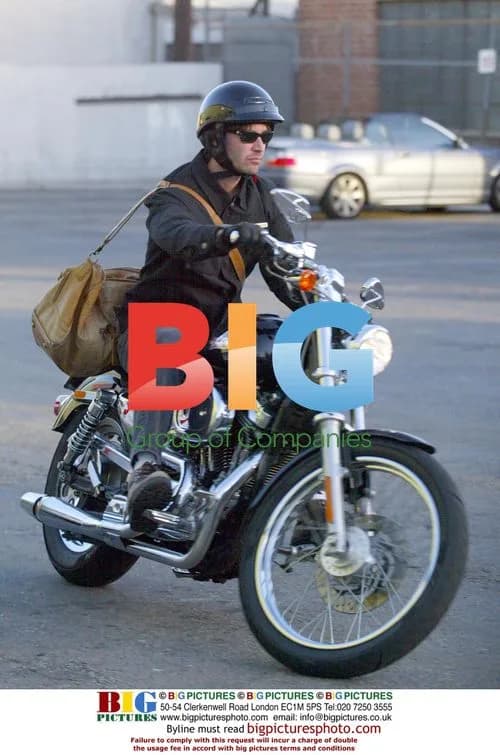 Keanu Reeves leaving the gym on his bike