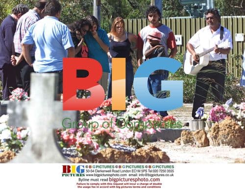 Neila Penny comforted at mother's gravesite