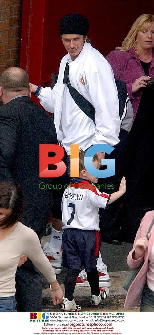 David Beckham and Son Brooklyn Leave Old Trafford