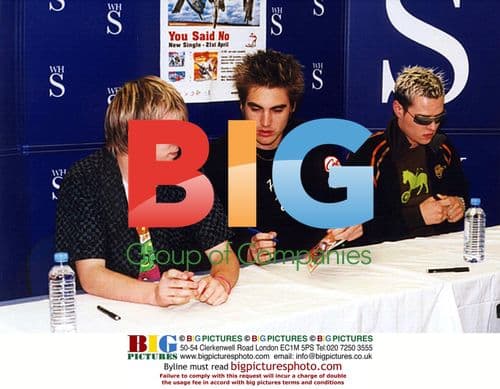 The first lady smiles at camera