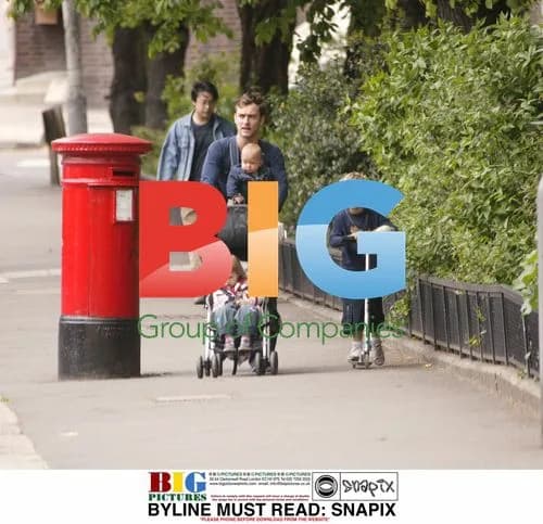 Jude Law Out with Children in North London