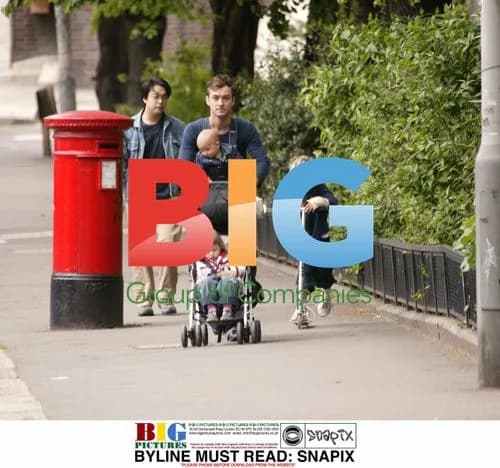 Jude Law Out with Children in North London