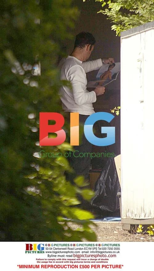 MR WRIGHT Pictured Looking at Porno Mags