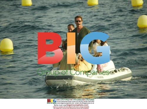 Arnold Schwarzenegger and family arrive by boat