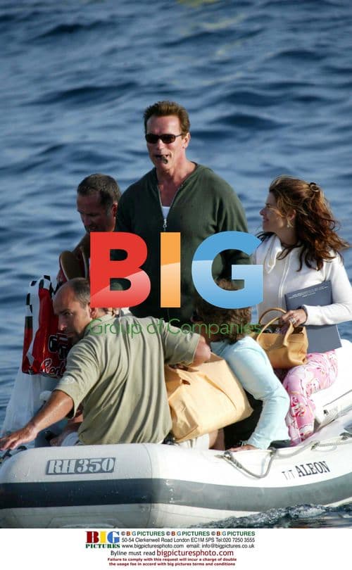 Arnold Schwarzenegger and Maria Shriver arrive by boat