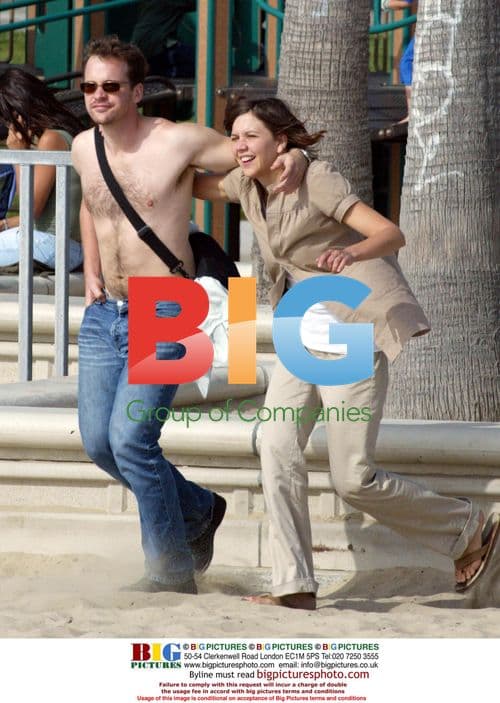 Maggie Gyllenhaal and Peter Sarsgaard on Beach