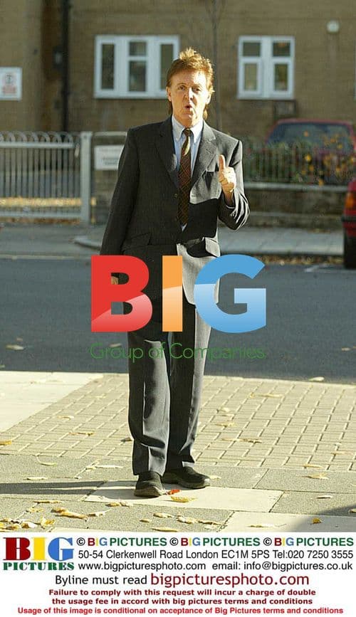 Paul McCartney Poses Outside London Home