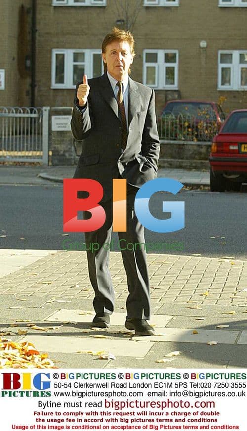 Paul McCartney Posing Outside Home