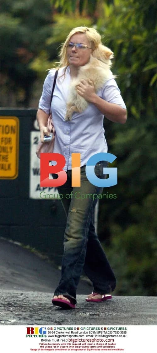Geri Halliwell out with new puppy