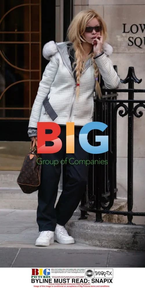 Alicia Douvall's Hair Piece Mishap in London
