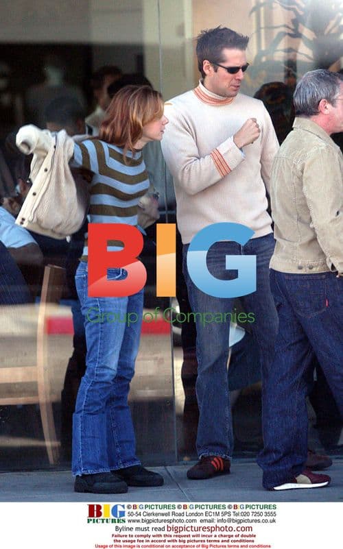 Alyson Hannigan and Alexis Denisof enjoying stroll