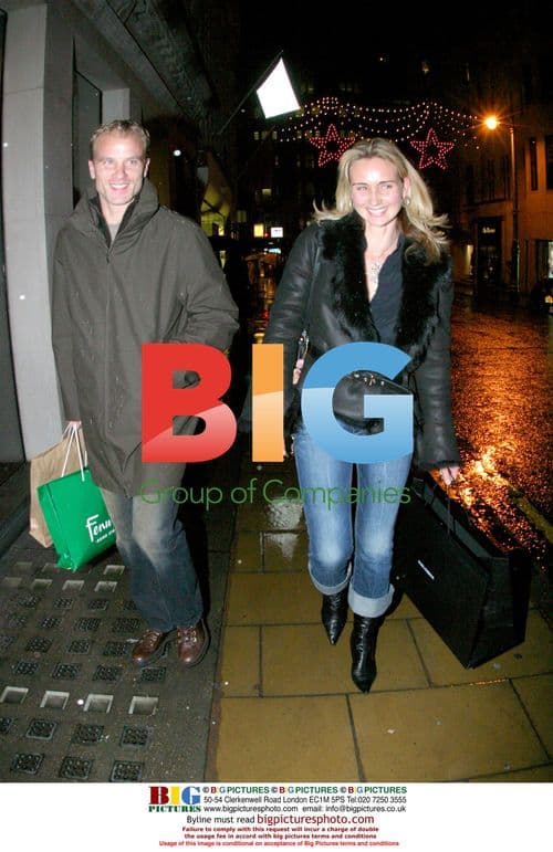 Dennis Bergkamp goes shopping with wife