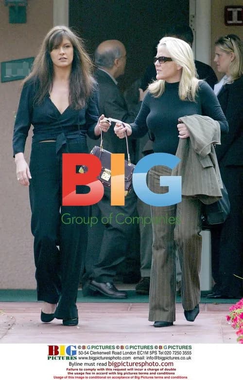 Catherine Zeta Jones and George Clooney leaving Beverly Hills Hotel