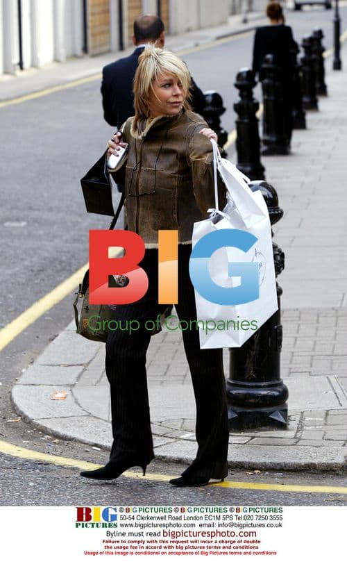 Leslie 'Lips' Ash Spotted Shopping in London