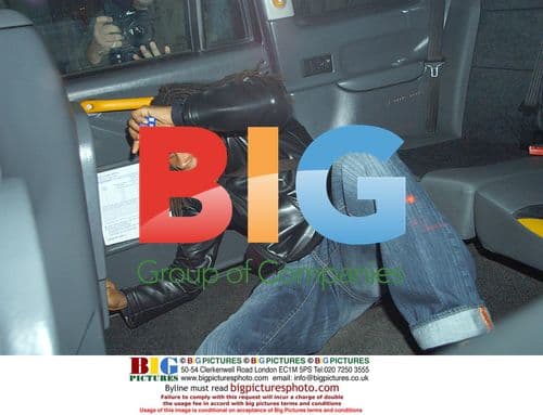 Edgar Davids Hides From Paparazzi