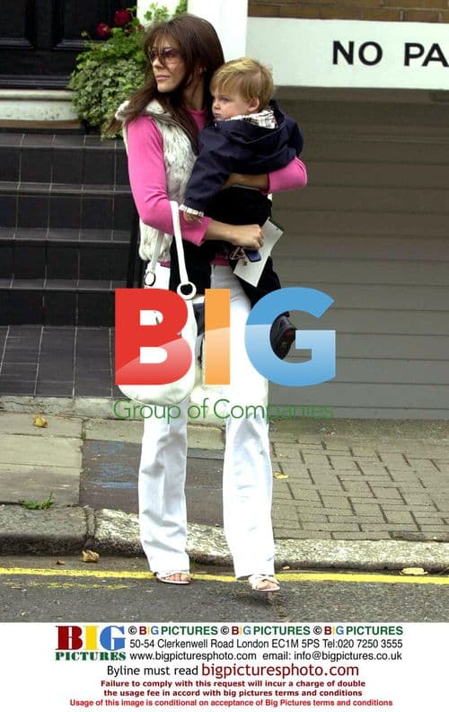 Liz Hurley leaving house with son