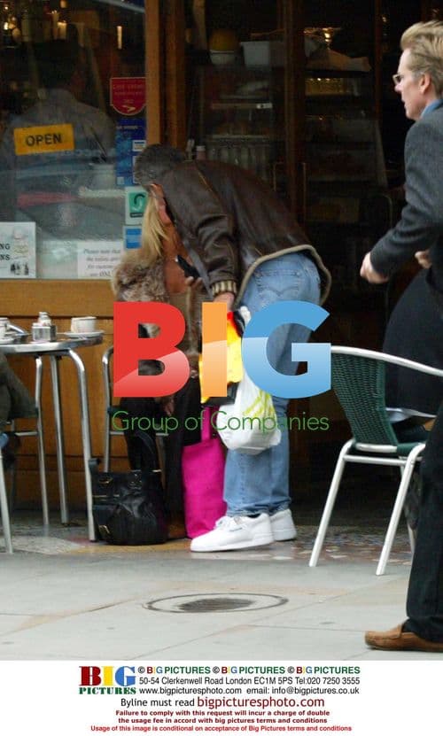George and Alex Best at coffee shop