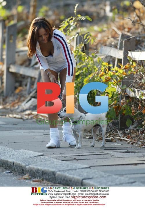 Model Jerri Byrne walks dog in London Park