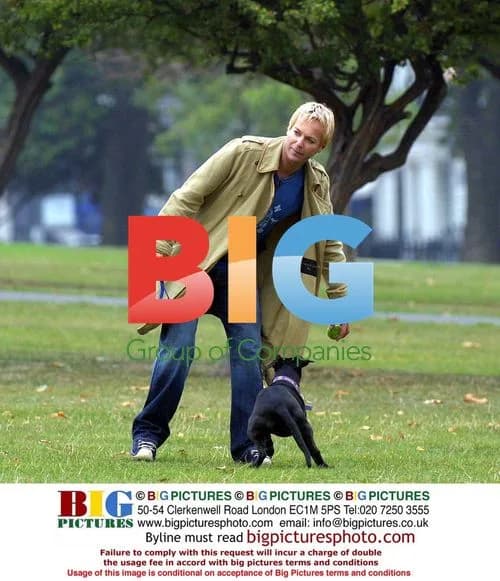 Julian Clary with his dog Valerie in a London park
