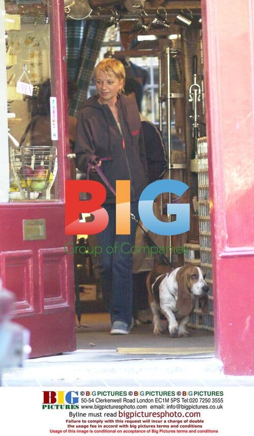 DJ Sara Cox and companion out in North London