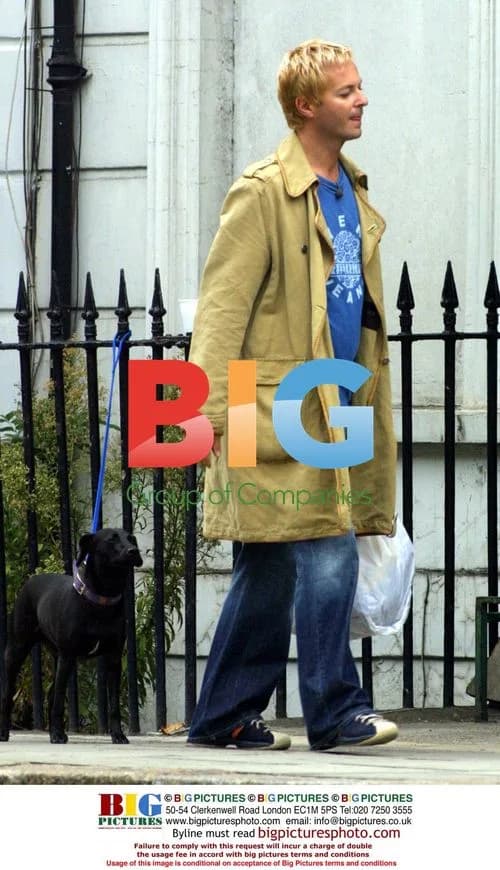 Julian Clary with Dog Valerie in North London Park