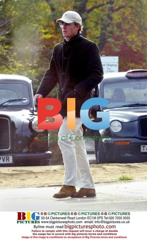 Hugh Grant strolling through Hyde Park