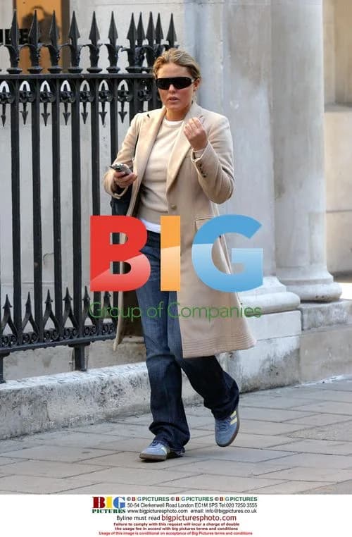 Patsy Kensit texting while out walking in London