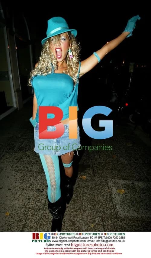 Emma Jones in Blue Party Outfit