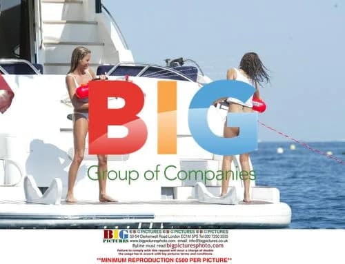 Model Jordan and friend Jerri Byrne water fight on yacht