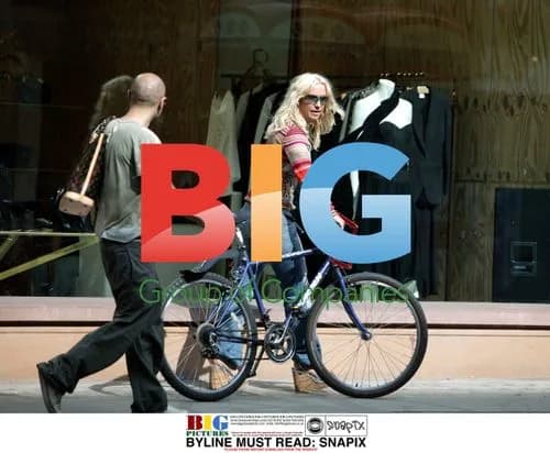 Meg Matthews on Bike in London