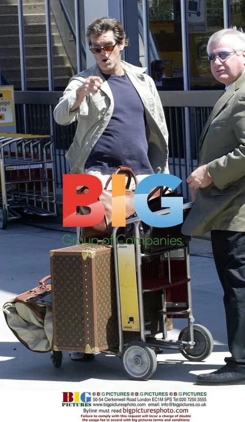 Pierce Brosnan rides bicycle