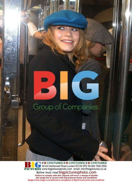 Two models posing on red carpet